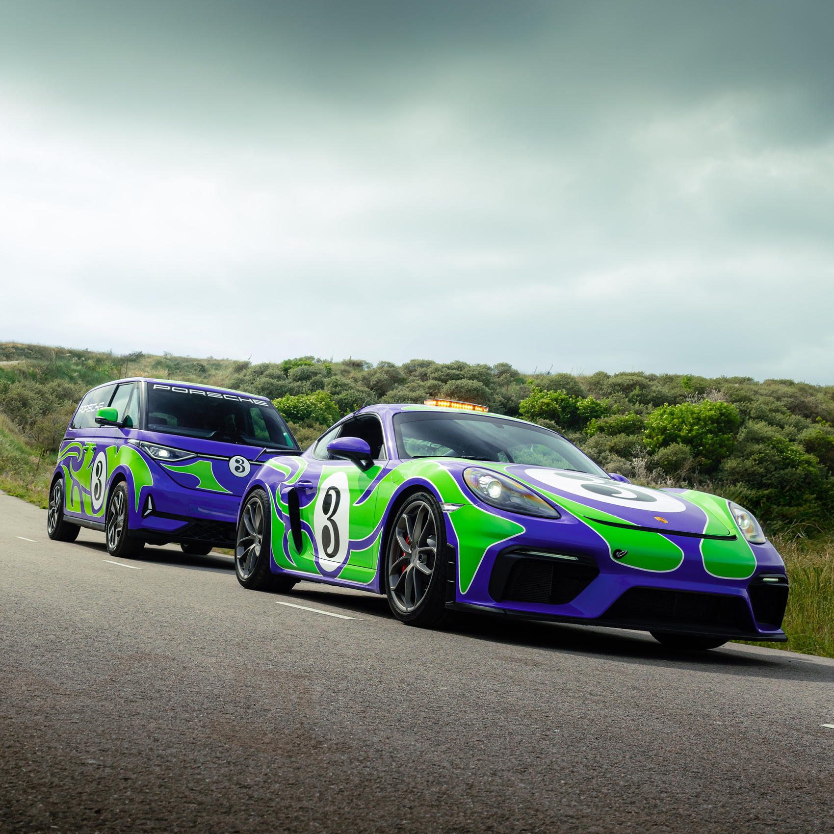The 'Hippie' livery designed by AGH & Friends on the 718 Cayman GT4 and Volkswagen ID. Buzz.