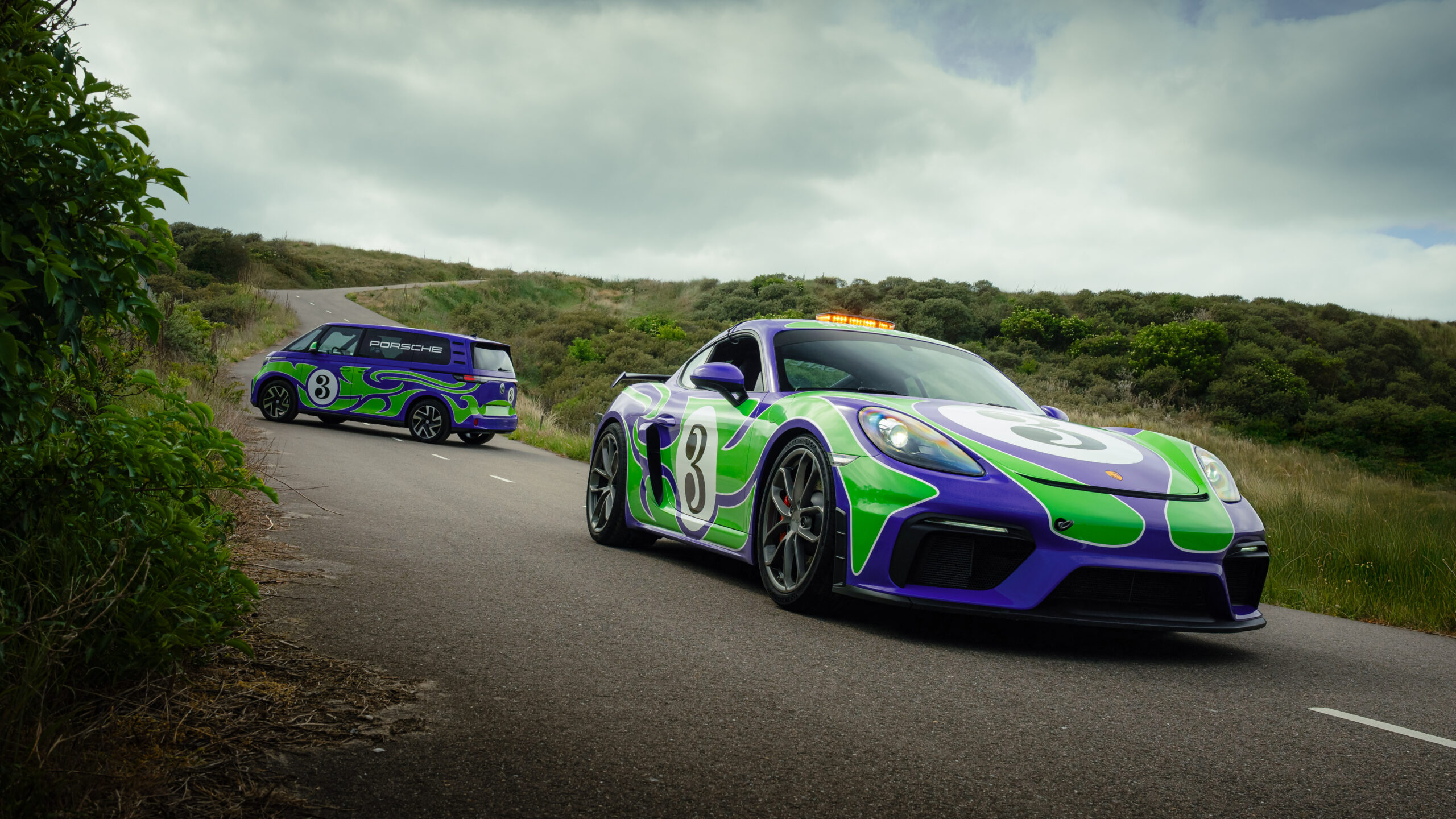 The 'Hippie' livery designed by AGH & Friends on the 718 Cayman GT4 and Volkswagen ID. Buzz.
