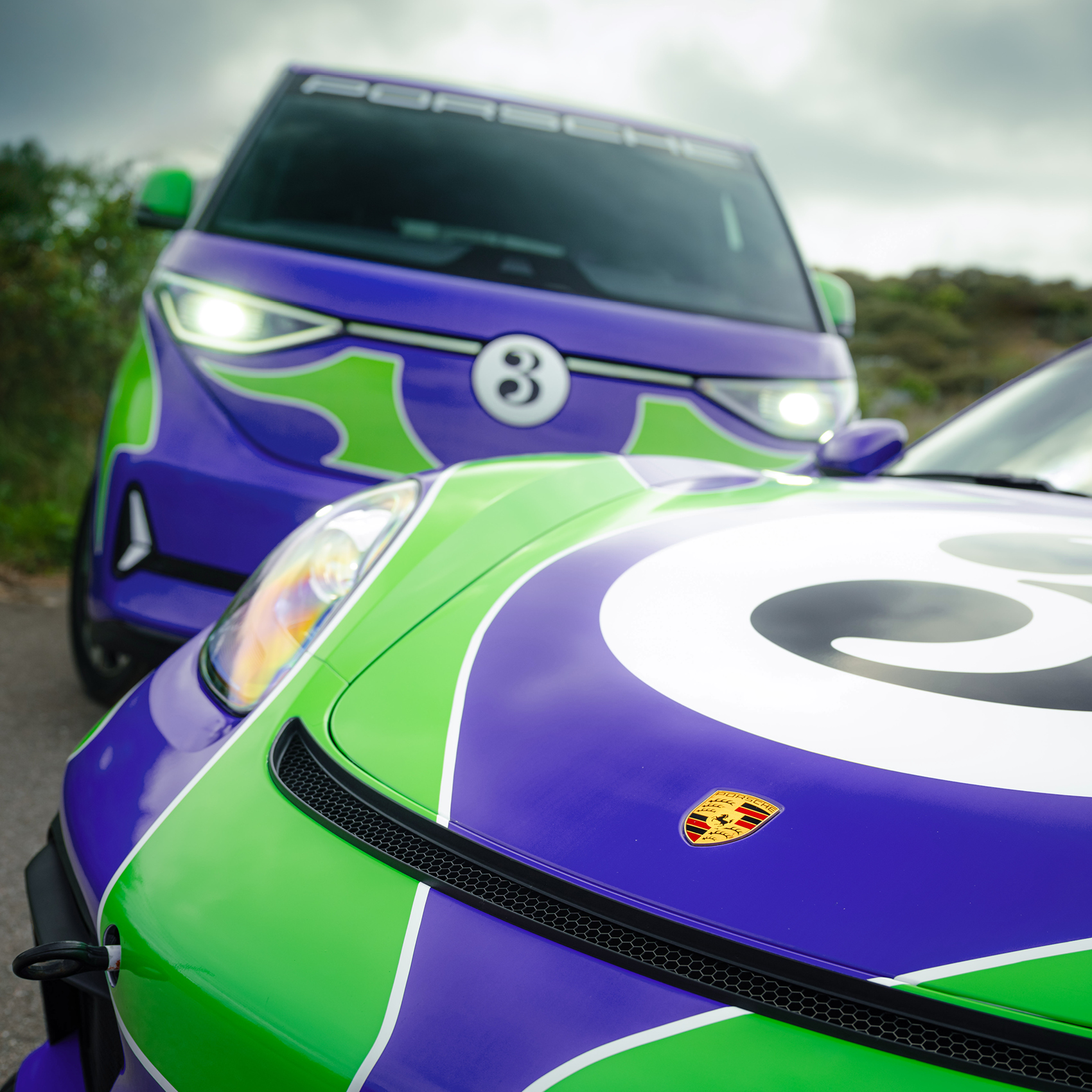 The 'Hippie' livery designed by AGH & Friends on the 718 Cayman GT4 and Volkswagen ID. Buzz.